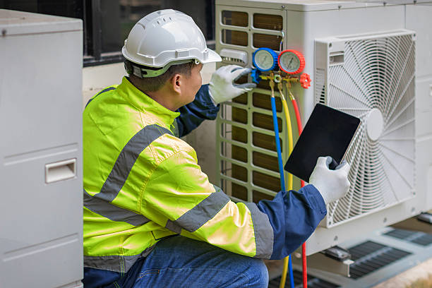 Professional Heat Pump Repair technician working in Micro, NC
